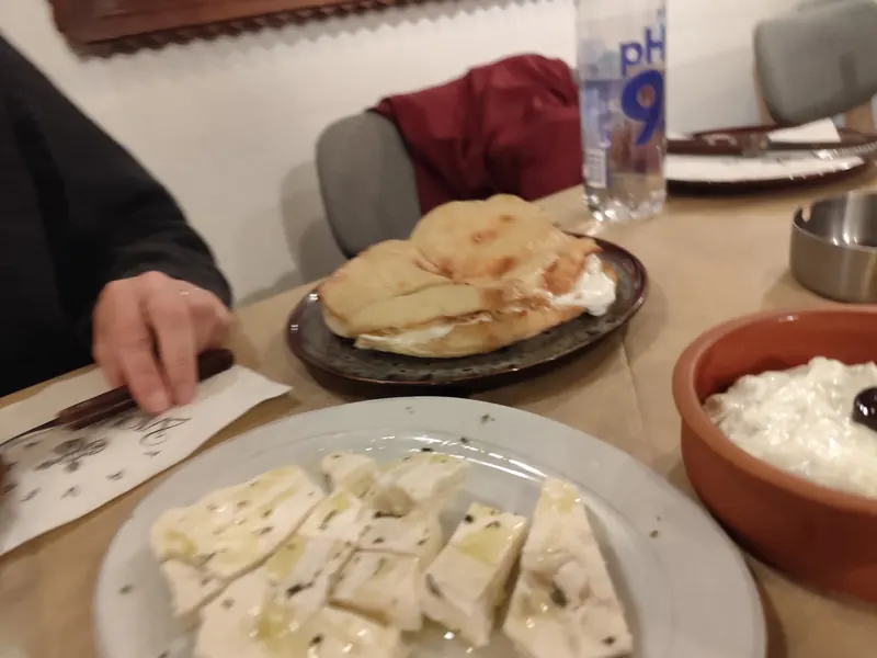 White cheese with flatbread and a bowl of tarator